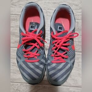 Nike Gray Athletic Sneakers with Bright Coral Swoosh